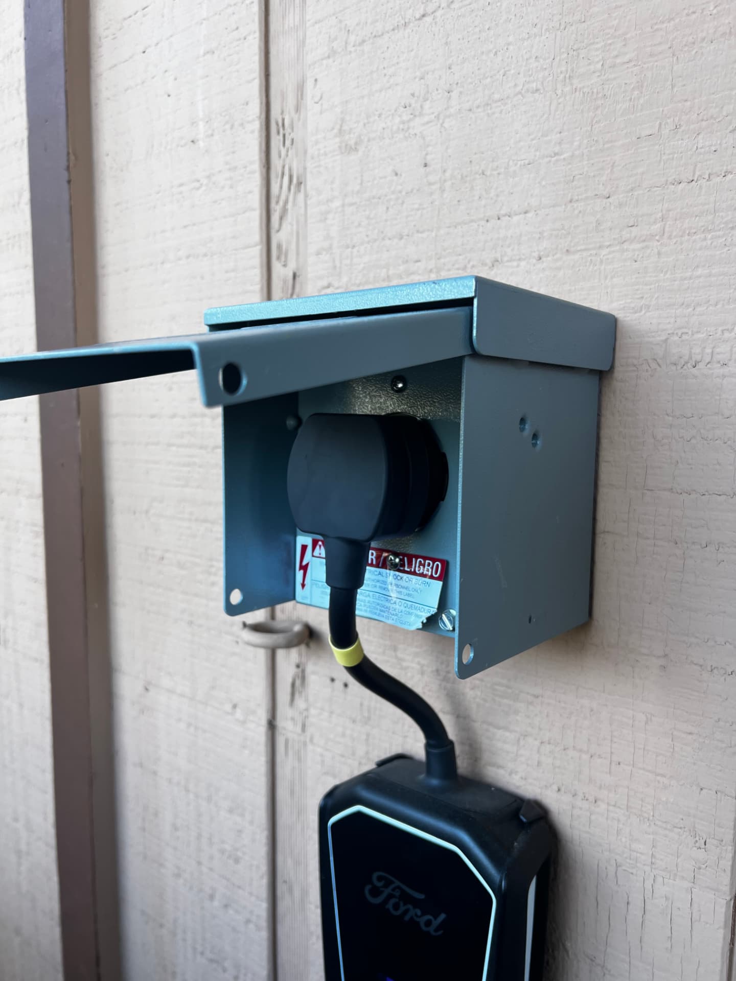 Weatherproof 240V exterior outlet for EV charging